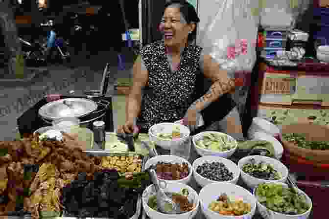 A Bustling Saigon Street Food Stall, With Various Dishes On Display. Street Food Asia: Saigon Bangkok Kuala Lumpur Jakarta