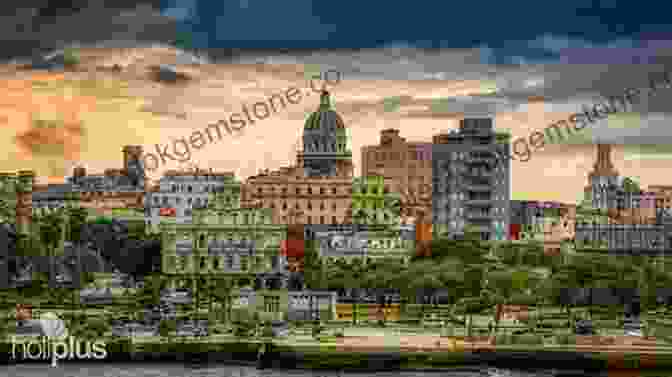 A Panoramic View Of Havana Bay, With The Iconic Dome Of The Havana Cathedral In The Foreground And The Malecón Seawall Stretching Along The Waterfront. Havana Bay: An Arkady Renko Novel (Arkady Renko 4)