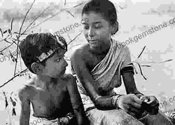 A Scene From 'Pather Panchali' Depicting A Young Apu And Durga Playing In A Field Our Films Their Films Satyajit Ray