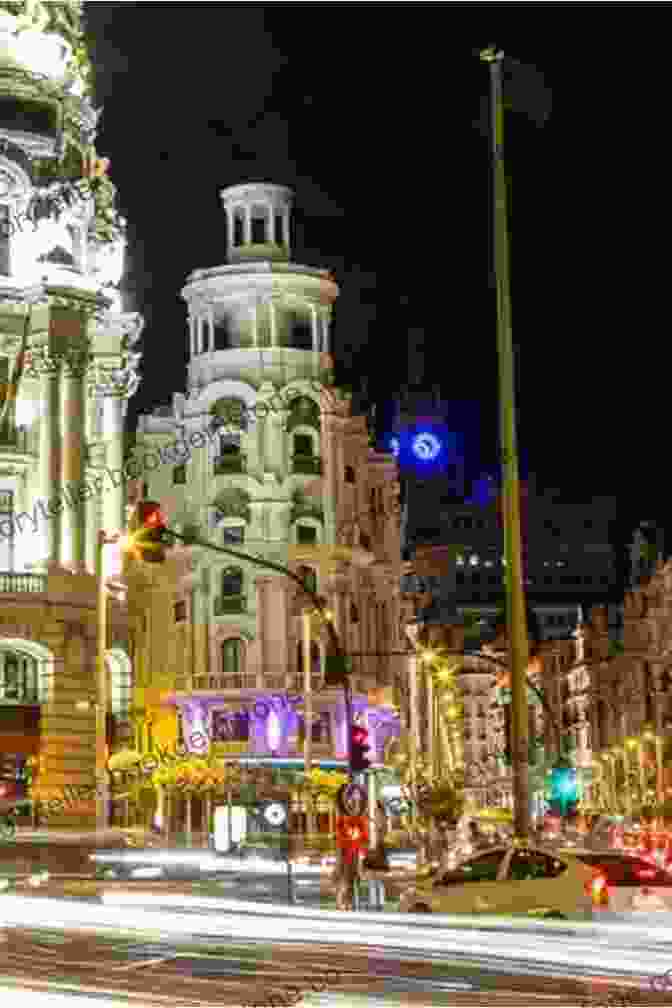 A Vibrant Street Scene In Madrid At Night, With People Enjoying The Lively Atmosphere And Nightlife Lonely Planet Madrid (Travel Guide)
